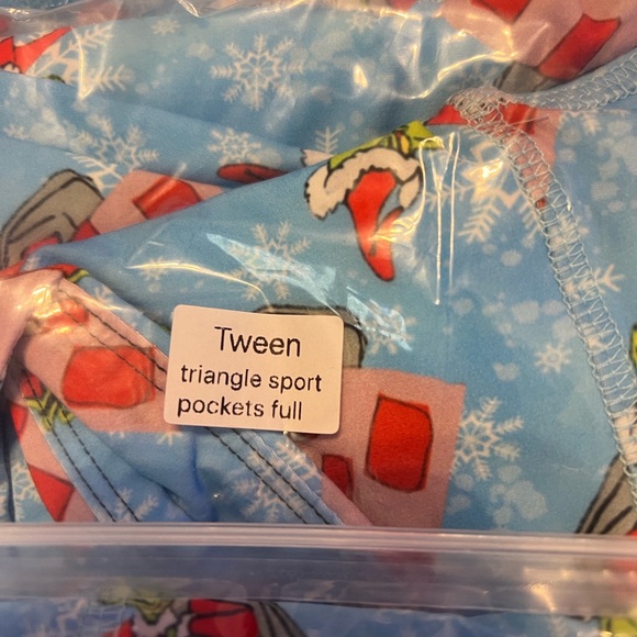 Have fun during the holidays wearing a pair of The Grinch Leggings! - Picture 2 of 4